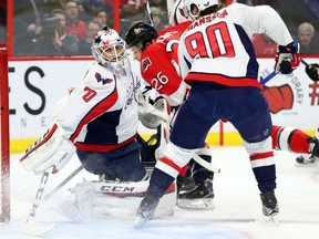 Braden Holtby of the Washington Capitals sees plenty of action by the Ottawa Senators during first period of NHL action at Canadian Tire Centre in Ottawa, March 22, 2016. JEAN LEVAC