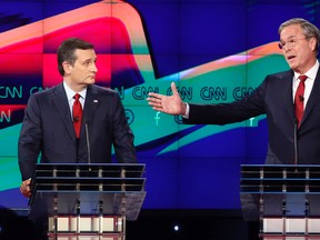 Former Florida Gov. Jeb Bush, right, makes a point as Sen. Ted Cruz, listens on during the Republican presidential debate in Las Vegas, in this Dec. 15, 2015 file photo. (AP Photo/John Locher, File)