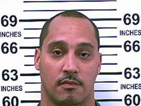 This July 2015 photo provided by the New York Department of Corrections and Community Supervision shows Richard Rosario who has served 20 years in prison for a shooting despite the fact that he gave police the names of 13 people who could vouch he was in Florida when the shooting happened. Prosecutors now plan to ask a judge Wednesday, March 23, 2016, to overturn Rosario's murder conviction and free him as they reinvestigate his case. (Department of Corrections and Community Supervision via AP)