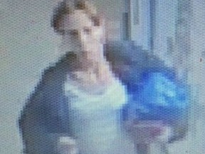 Investigators need help identifying a woman who allegedly pretended to be a parent when she entered schools in East York, the Beaches and Scarborough then stole cash, electronics and other items. (Supplied photo/Toronto Police)