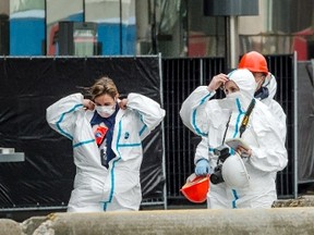 Forensic police officers prepare outside the terminal at Brussels international airport following bomb attacks in Brussels metro and Belgium's International airport of Zaventem, Belgium, March 23, 2016. REUTERS/Geert Vanden Wijngaert/Pool