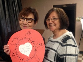 Keynote speaker Cindy Blackstock and Beverly Wrightman pose for a picture on Thursday, March 10, at the Dben-Daag-Zid 'Belong to a Group' conference at the Walpole Island Sports Complex. The conference focused on Special Needs from a First Nations perspective.
