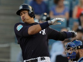 New York Yankees star Alex Rodriguez reacts as he swings and misses a pitch from Toronto Blue Jays starter Drew Hutchison Wednesday, March 16, 2016, in Tampa, Fla. (AP Photo/Chris O’Meara)