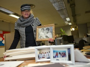 Justine Turner holds a photograph of her and her mother, part of the materials used in a documentary film about black history in London, titled Finding Freedom in the Forest City. (CRAIG GLOVER, The London Free Press)