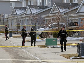 The scene of two now confirmed homicides near 213 Street and 49 Avenue March 23, 2106. Police say there is no danger to the public. (Larry Wong)