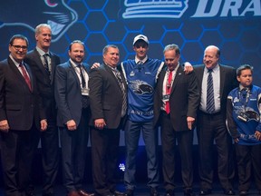 Joseph Veleno poses after being selected first overall by the Saint John Sea Dogs in the QMJHL draft in Sherbrooke, Que., on June 6, 2015. (THE CANADIAN PRESS/Vincent Ethier)