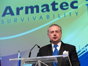 Armatec Survivability chief executive Karl Pfister accepts the London Chamber of Commerce 2016 Business Achievement Award for large business of the year during the ceremony held at the London Convention Centre on Wednesday evening. (CRAIG GLOVER, The London Free Press)