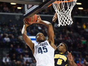High-flying Darryl Reynolds and the Villanova Wildcats will battle No. 3 Miami today. (USA TODAY)