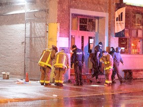 A man was shot and killed in a Leslieville alleyway near Queen St. E. and Carlaw Ave. on <arch 23, 2016. (John Hanley/Special to the Toronto Sun)