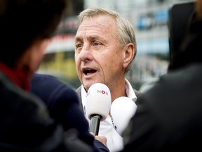 Former Dutch footballer and ex- FC Barcelona head coach Johan Cruyff speaks to journalists prior to the KNVB (Royal Dutch Soccer Association) congress at the Galgenwaard stadium in Utrecht on December 15,  2014.  (AFP PHOTO/ANP/ROBIN VAN LONKHUIJSEN)