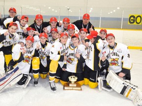 Members of the Mitchell Bantam AE's pose with their OMHA Group 4/5 AE trophy and include, back row (left): Ken Monden (trainer), Damon Kay, Owen Chaffe (head coach), Jake Monden, Kyle Richardson, Jeff Beehler (assistant coach). Middle row (left): Devin Fenwick, Kurtis Forrest, Clayton McCarthy, Caleb Tweddle, Jared McCarthy, David Rowland. Front row (left): Ryan Bell, Brenden Boville, Curt Eidt, Trevor DeJong, Tristan Beehler and James Vink. ANDY BADER/MITCHELL ADVOCATE