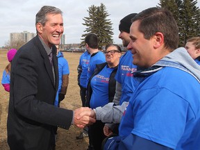 Progressive Conservative leader Brian Pallister (left) promised Thursday to boost literacy amongst kids if his party forms government. (Brian Donogh/Winnipeg Sun file photo)