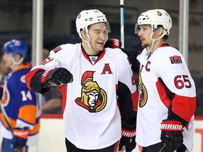 Ottawa Senators right wing Mark Stone (61) celebrates with defenceman Erik Karlsson (65) after scoring a goal against the New York Islanders during the third period at Barclays Center. The Islanders won 3-1. (Brad Penner-USA TODAY Sports)