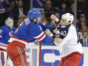 Columbus Blue Jackets’ Jared Boll (40) and New York Rangers’ Dylan McIlrath fight during the second period of a game Monday, Feb. 29, 2016, in New York. (AP Photo/Frank Franklin II)