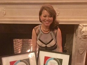 Homes by Avi president Alice Mateyko with the awards her company won at the Canadian Home Builders’ Association – Edmonton Region 2016 Awards of Excellence in Housing gala on March 19.