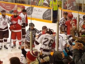 Players from the Flin Flon Bombers brawl with the Weyburn Red Wings Wednesday in SJHL playoff action. (YouTube screen grab)