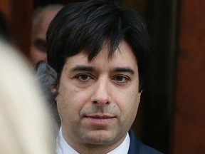 Jian Ghomeshi, found not guilty of sexually assaulting three women, leaves Old City Hall. (Craig Robertson/Toronto Sun/Postmedia Network)