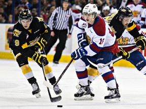 Nolan Patrick, left, shown here playing against the Oil Kings earlier this season, is the son and nephew of former NHLers. (File)