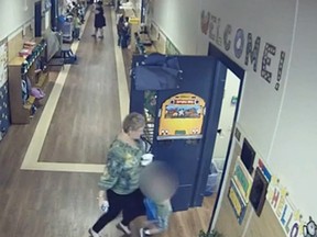 A south Georgia teacher has resigned after surveillance video appears to show her knocking a special needs student to the ground. (Newsy video screengrab)
