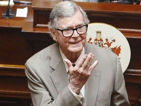 In this April 3, 2013 file photo, author Earl Hamner Jr. blows a kiss to relatives in the gallery as he is honoured by the Virginia Senate at the state capitol in Richmond, Va. On March 24, 2016, Hamner, who created "The Waltons" television show, died in Los Angeles at the age of 92, according to Ray Castro Jr., a friend who produced a documentary about the writer. (AP Photo/Richmond Times-Dispatch, Bob Brown)