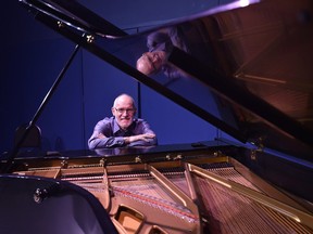 Joachim Segger is a music professor at King's University, pictured sitting at one of Glenn Gould's pianos.