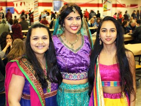 From left, Shravani Shah, Maitri Patel and Hardee Shah, all students at Northern, participated in the fashion show at the annual Multicultural Awareness Club (MAC) event on Thursday, March 24, 2016 in Sarnia, Ont. (Terry Bridge, The Observer)
