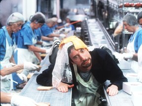 Monotony at his job at the sandwich factory gets the better of Tom Green in Freddy Got Fingered. (File pic)