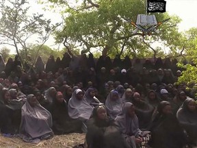 In this file photo taken from video released by Nigeria's Boko Haram terrorist network, Monday May 12, 2014, shows missing girls abducted from the northeastern town of Chibok. (AP Photo)