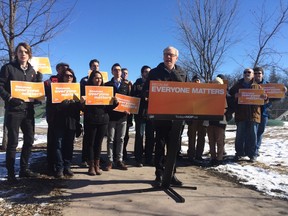 Greg Selinger announces a $20-million investment in provincial tourism at a campaign stop at Assiniboine Park on Saturday. (David Larkins/Winnipeg Sun)