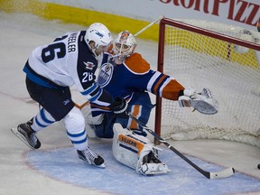 Winnipeg Jets Blake Wheeler scores during the shoot out on Edmonton Oilers  goaltender Laurent Brossoit  on February 13,  2016 in Edmonton. (Greg Southam)