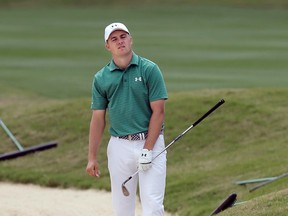 Jordan Spieth reacts to his shot on the 15th hole against Louis Oosthuizen at the Dell Match Play Championship at Austin County Club, Saturday, March 26, 2016, in Austin, Tex. (AP Photo/Eric Gay)