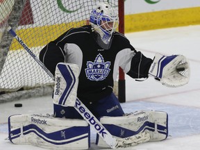 Goalie Antoine Bibeau makes a save at the Toronto Marlies practice in Toronto on Wednesday April 22, 2015. (Veronica Henri/Toronto Sun)