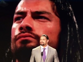 Roman Reigns a.k.a. Joe Anoa'i during his days with the Edmonton Eskimos in 2008, will be competing against WWE World Heavyweight champion Triple H in the main event at Sunday's Wrestlemania. (File)