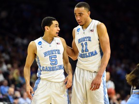 North Carolina Tar Heels guard Marcus Paige (5) talks with forward Brice Johnson (11) during the second half against the Indiana Hoosiers at Wells Fargo Center. (Bob Donnan/USA TODAY Sports)