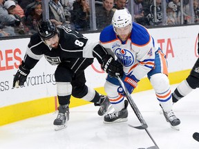 Los Angeles Kings defenceman Drew Doughty battles with Edmonton Oilers left winger Taylor Hall for control of the puck Saturday at Staples Center. (Jayne Kamin-Oncea/USA TODAY Sports)