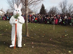 Seaforth Coun. Bob Fisher/Easter Bunny stands in front of a crowd of anxious children waiting for the BIA's second annual Community Easter Egg Hunt to start.(Shaun Gregory/Huron Expositor)