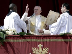 Pope Francis delivers the Urbi et Orbi benediction at the end of the Easter Mass in Saint Peter's Square at the Vatican March 27, 2016. REUTERS/Max Rossi