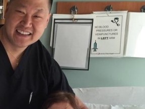 This is Dr. MIchael Yang, head of the spine team, seeing our Fancy Nancy
after her fusion surgery. The pink feather boa did not go into the operating room.