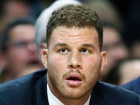 Los Angeles Clippers' Blake Griffin sits on the bench during the first half of an NBA game against the Miami Heat in Los Angeles. (AP Photo/Danny Moloshok, File)