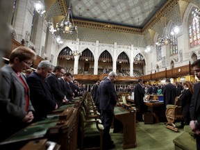 Members of Parliament take part in a moment of silence for the late Conservative MP Jim Hillyer, who was found dead in his office on Wednesday, in the House of Commons on Parliament Hill in Ottawa, Canada, March 23, 2016. REUTERS/Chris Wattie