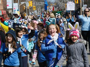 Thousands turned out for the 50th Beaches Easter parade on Sunday. (STAN BEHAL, Toronto Sun)