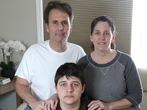 Michael Warner and his wife Debbie Hennebury with their son Dayton in Kingston on Tuesday March 22 2016. Dayton was a victim of a recent social media prank. Ian MacAlpine /The Whig-Standard/Postmedia Network