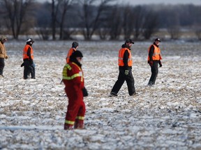 Volunteers search for Chase Martens last week. (THE CANADIAN PRESS)