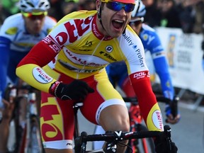 Belgian cyclist Antoine Demoitie died after he was hit by a motorbike following a fall at the Gent-Wevelgem classic race in northern France on Sunday, March 27, 2016. (Anne-Christine Poujoulat/AFP/Files)