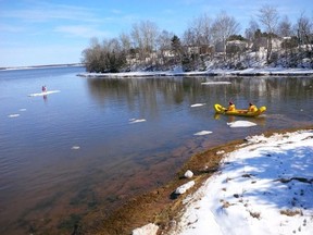 Rescuers head out to two youngsters on an ice floe that drifted away from shore in Charlottetown Sunday afternoon, March 27, 2016. THE CANADIAN PRESS/ho-Charlottetown Fire Department