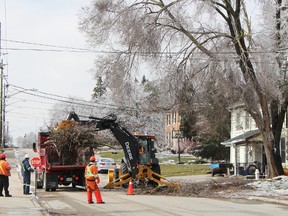 Postmedia photo
Six Greater Sudbury Hydro powerline electricians who left Good Friday to help restore power in southern Ontario will likely be there for a few more days. In this photo, town crews in Bradford clean up.