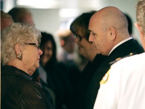 George Smitherman pays his respects to Diane Ford. (CRIAG ROBERTSON, Toronto Sun)