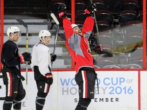 Ottawa Senators forward Zack Smith celebrates during practice at the Canadian Tire Centre in Ottawa on March 28, 2016. (JULIE OLIVER/POSTMEDIA)