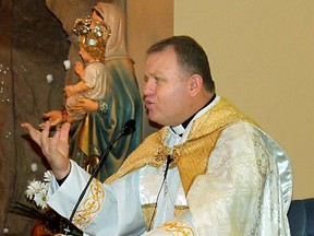 Father Amer Saka is seen in a photo taken from the Facebook page of St. Joseph's Chaldean Catholic Church.