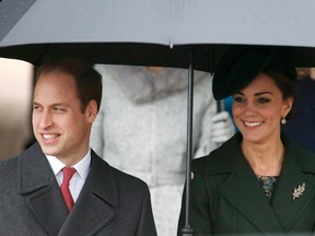 Britain's Prince William and his wife Kate leave after attending the Christmas Day service at church in Sandringham, eastern England, December 25, 2015. REUTERS/Peter Nicholls